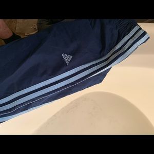 Light blue three stripe Adidas sweatpants